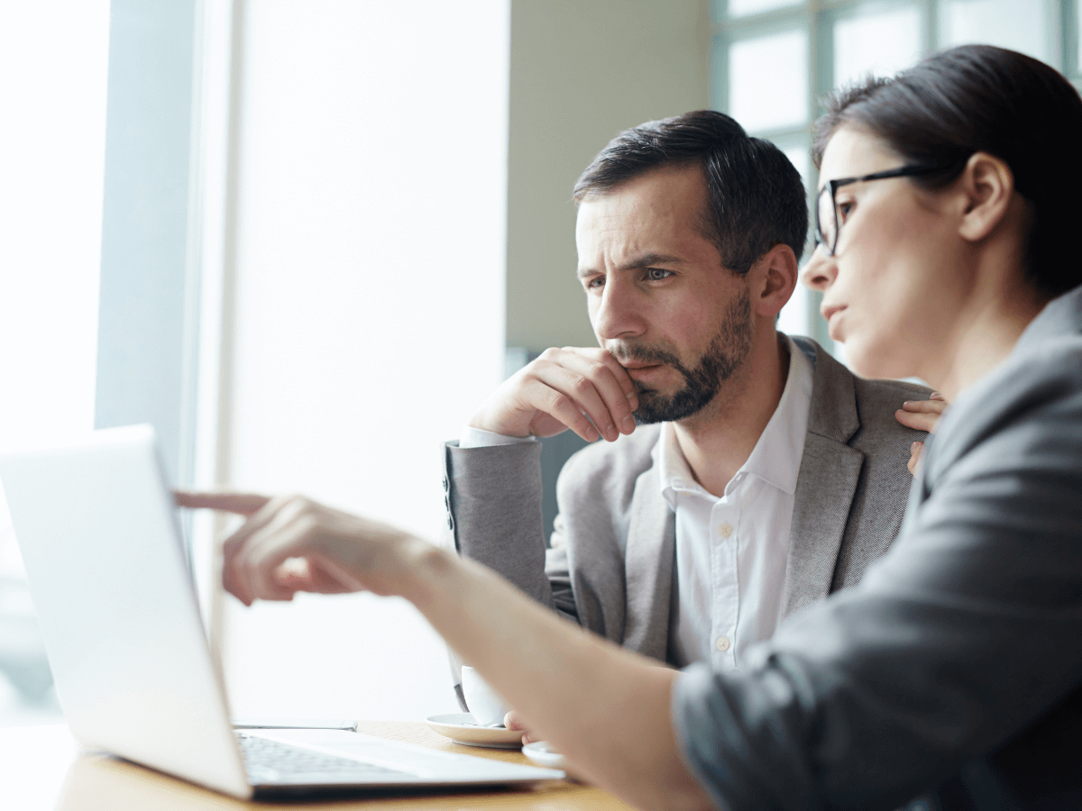Tech professionals implementing cyber security checklist for small business.
